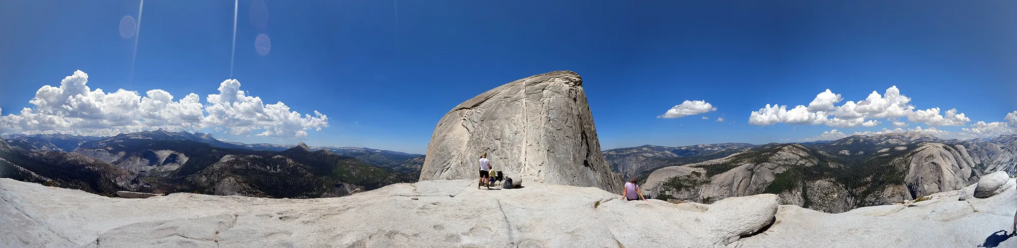 View of Half Dome from Sub Dome at Yosemite National Park, California. Panorama photo.