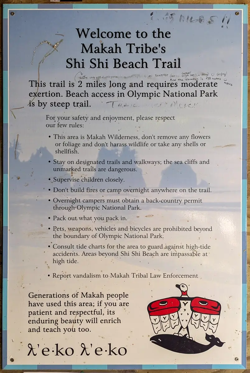 Welcome To Makah Tribe Shi Shi Beach Sign A sign at the Shi Shi Beach Trailhead which reads, "Welcome to the Makah Tribe's Shi Shi Beach Trail". Which then gives information about the trail. Hiker's experience is written on the sign.