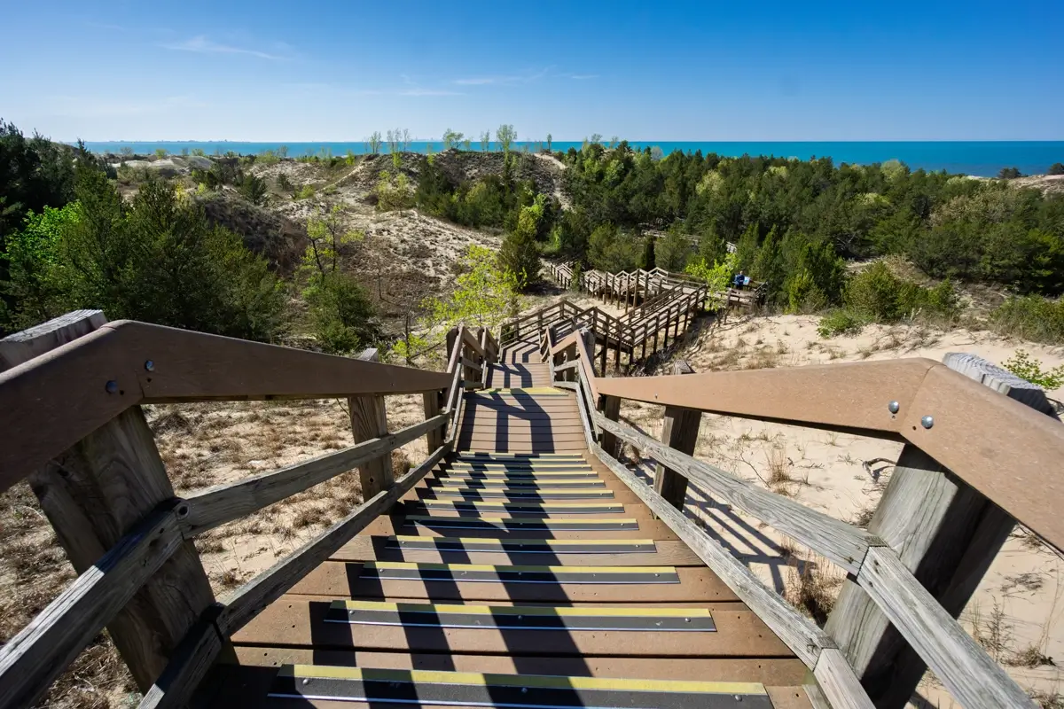 Indiana Dunes NP Staircase overlooking dunes, forest, and Lake Michigan views from the Dune Succession Trail at Indiana Dunes National Park.
